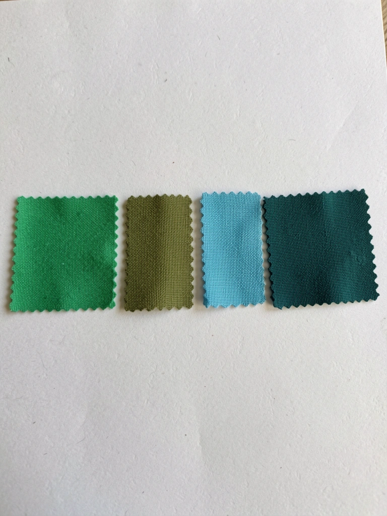 Cartela com amostras de verde jade, musgo, piscina e petróleo lado a lado